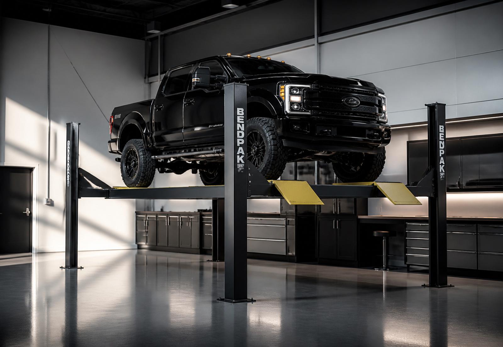 RAM heavy-duty pickup on a four-post workshop lift